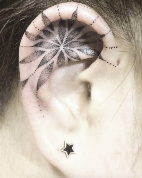 Dotwork ear tattoo by Katy Hayward