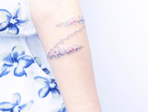 Floral zig zag tattoo by Mini Lau