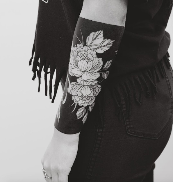 Heavy blackwork floral cuff tattoo by Tritoan Ly