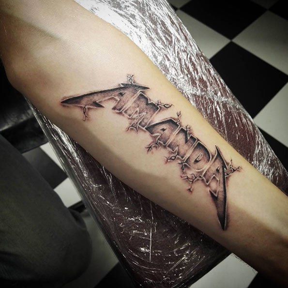 Metallica-esque font tattoo by Bloodline Art