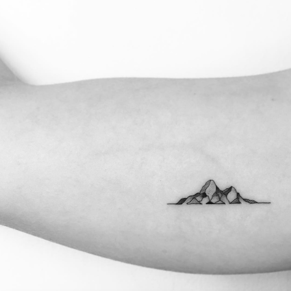 Mountain range tattoo by OK