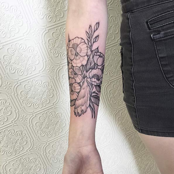 Floral rabbit paw tattoo by Johno