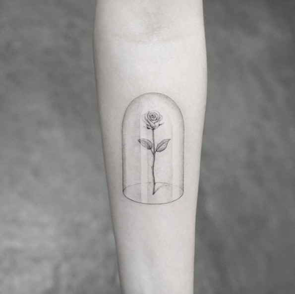 Rose in a glass case tattoo by Sanghyuk Ko