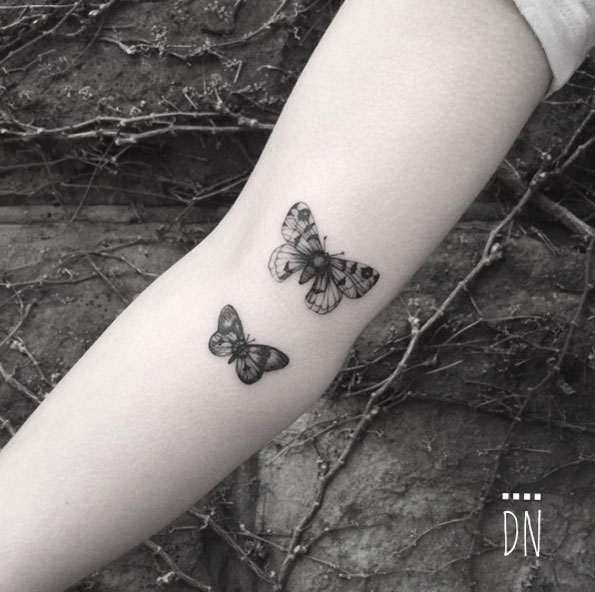 Single needle blackwork moth tattoos by Dino Nemec
