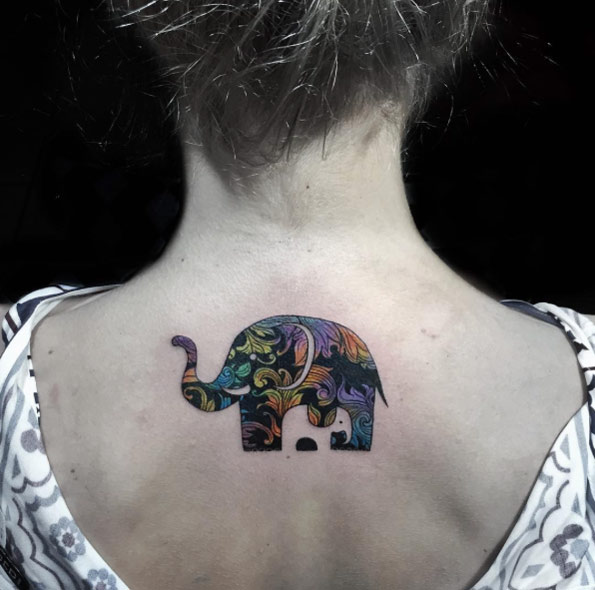 Wonderful mom and baby elephant tattoo by Nadya Natassya