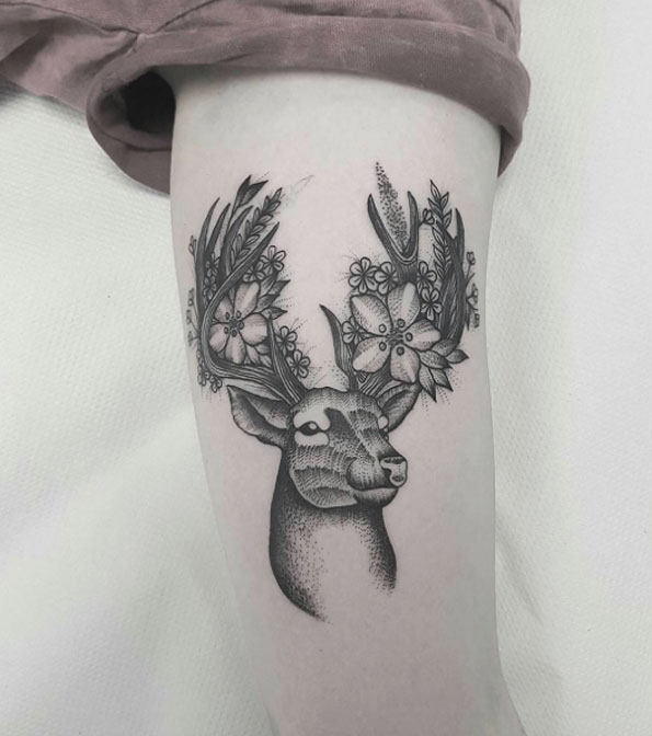 Beautiful floral stag tattoo by Jules Gordon