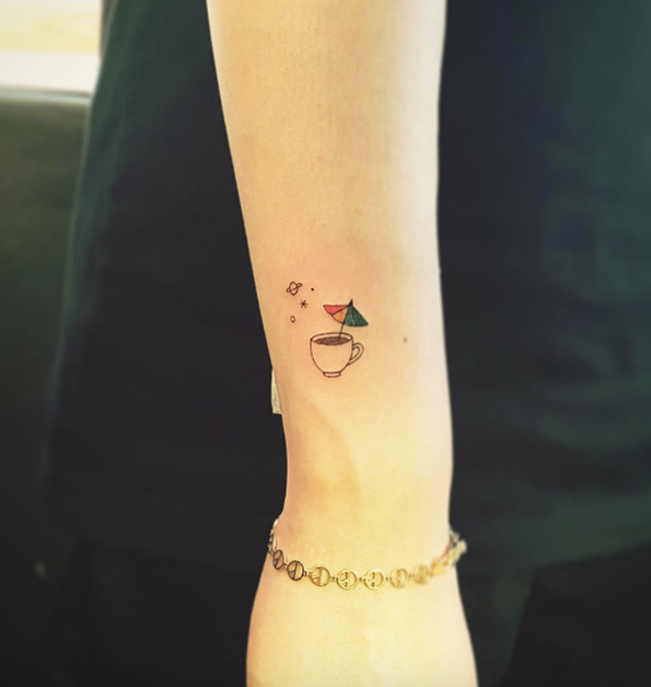Tiny wrist tattoo by Masa Tattooer