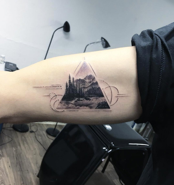 Triangular landscape tattoo by Eva Krbdk