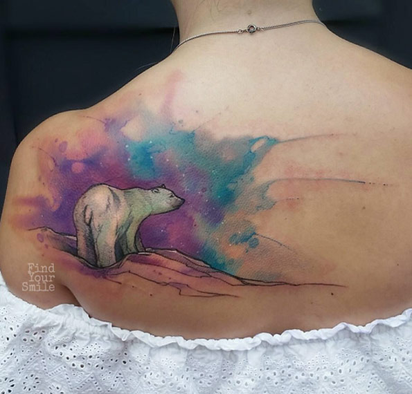 Breathtaking watercolor polar bear tattoo by Russell Van Schaick