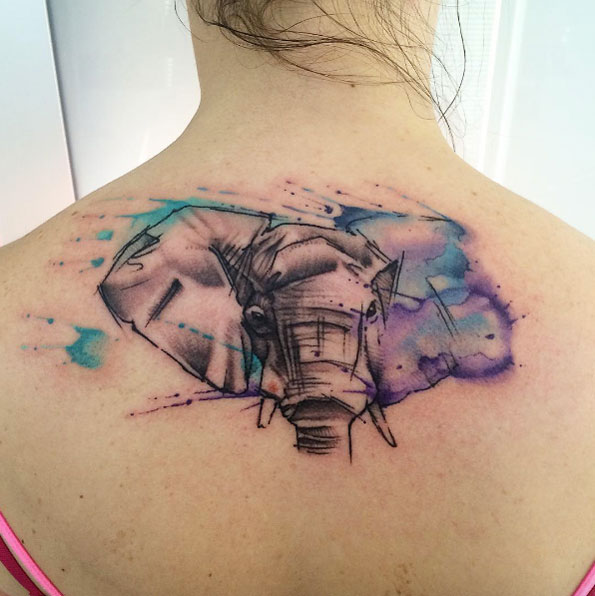 Watercolor elephant tattoo on back by Sandro Stagnitta