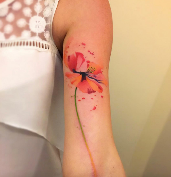 Watercolor poppy tattoo by Bora Tattoo