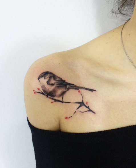 Watercolor songbird tattoo by Sandro Stagnitta