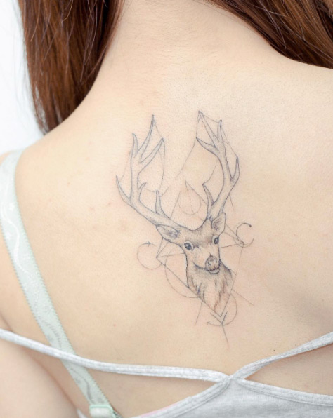 Dr. Woo-influenced stag tattoo by Hello Tattoo