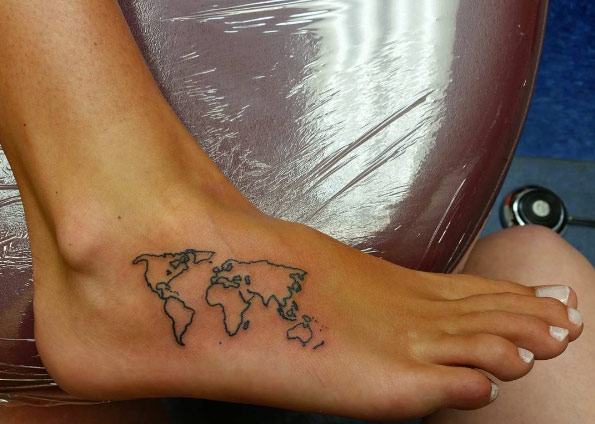 World map tattoo on foot by Kaitlyn Garfoot