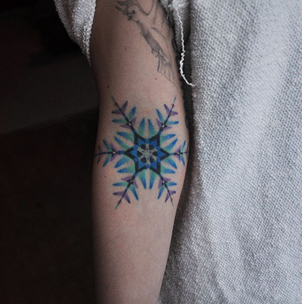 Kaleidoscope snowflake tattoo by David Peyote