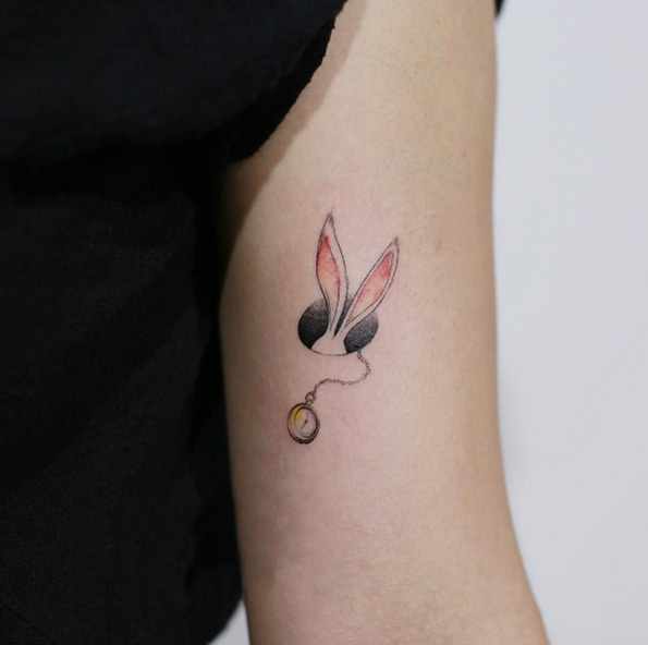Alice in wonderland white rabbit tattoo by Tattooist Doy