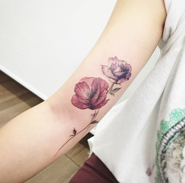 Poppy and rose tattoo by Tattooist Flower