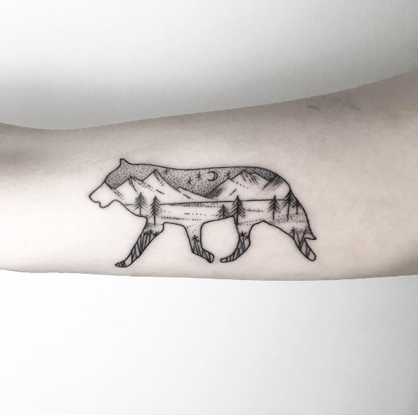 Landscape wolf tattoo by Maria Fernandez