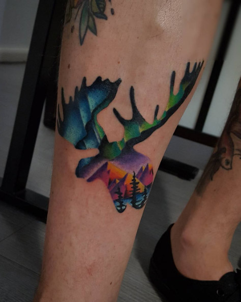 Colorful moose landscape tattoo by Marco Spok