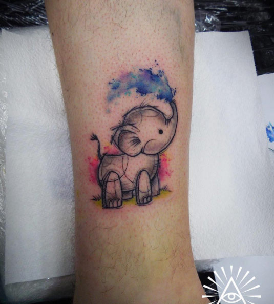 Watercolor baby elephant tattoo by Cynthia Sobraty