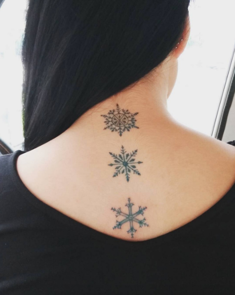 Spinal snowflake tattoos by Angelene Bong