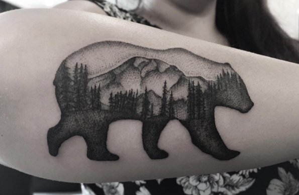 Landscape bear tattoo on forearm by Zeke Yip