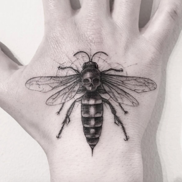 Bee tattoo on hand by Sanghyuk Ko