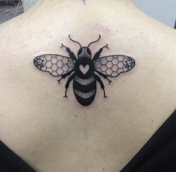 Bee tattoo on back by Lauren Marie Sutton