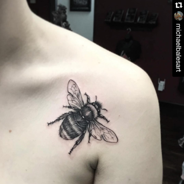 Bee tattoo on shoulder by Michael Bales
