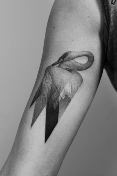 Surreal transparent swan tattoo by Paweł Indulski