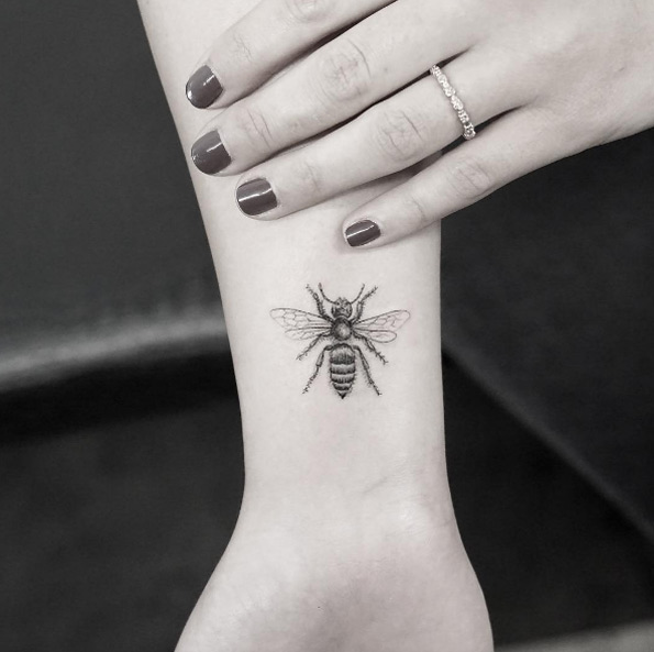 Blackwork bee tattoo by Sanghyuk Ko