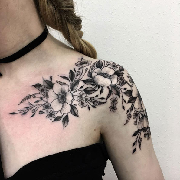 Blackwork florals on shoulder by Vlada Shevchenko