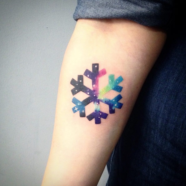 Cosmic snowflake tattoo by Martyna Popiel
