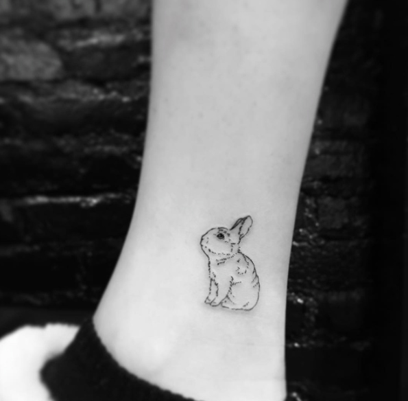 Minimalistic bunny rabbit tattoo by Evan