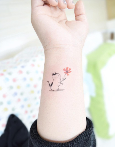 Cute cat with a flower on wrist by Banul