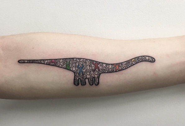 Cool dinosaur tattoo by Zeke