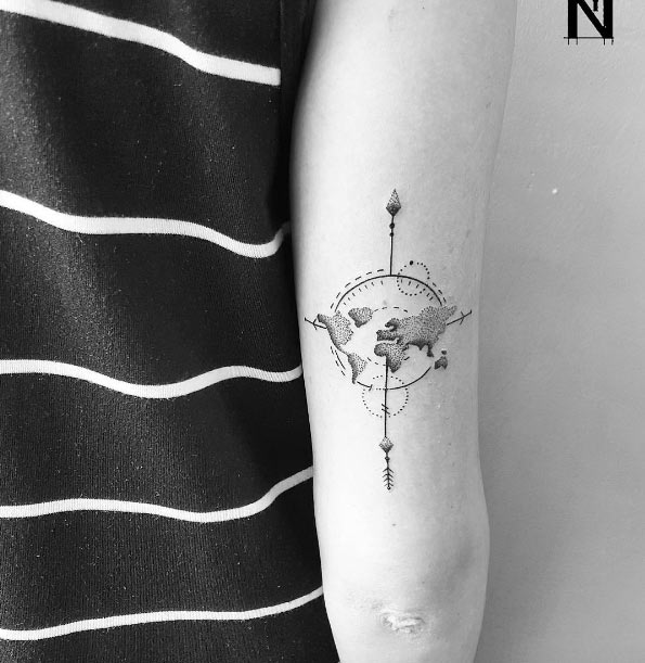 Dotwork globe and compass tattoo by Noam Yona
