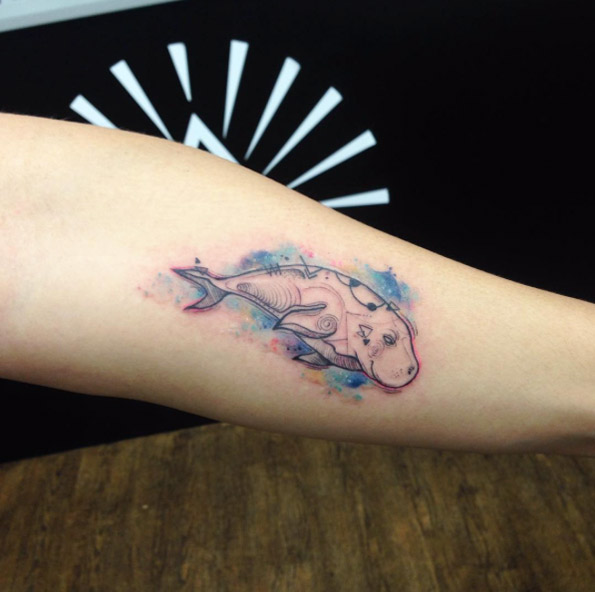Fun little dugong tattoo by Cynthia Sobraty