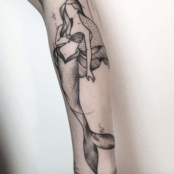 Faceless mermaid tattoo by Maria Fernandez