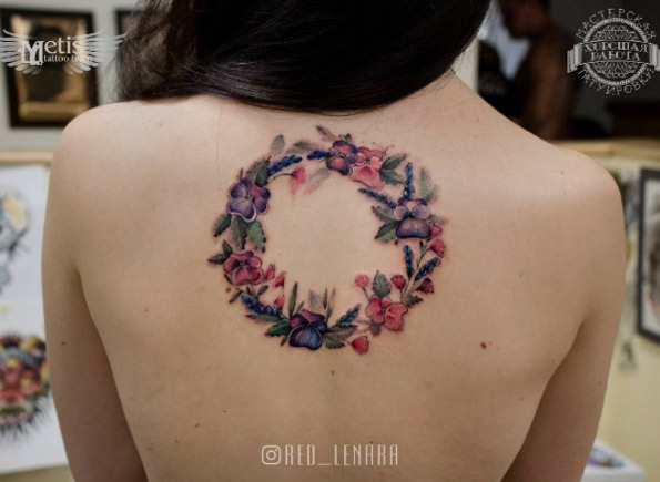 Beautiful floral wreath tattoo by Lenara