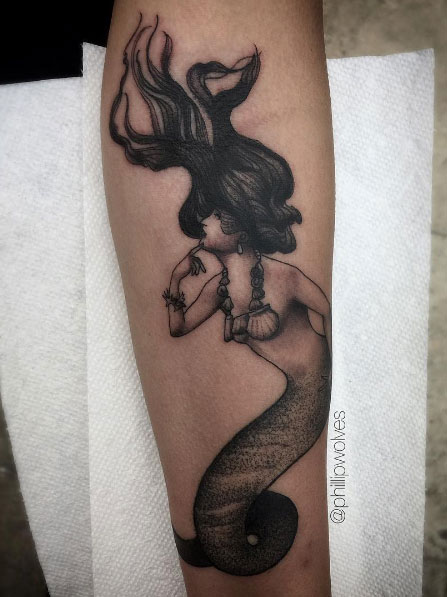 Mermaid tattoo on forearm by Phillip Wolves