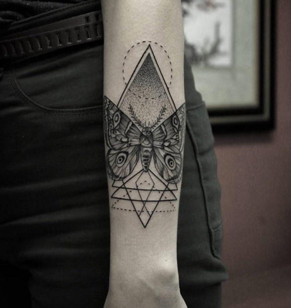 Geometric butterfly tattoo by Marquinho Andre