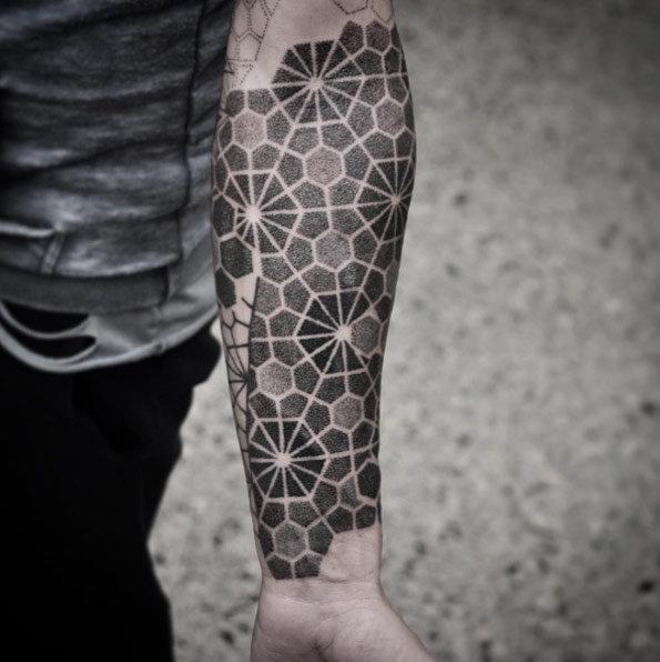 Geometric pattern tattoo by Chris Jones