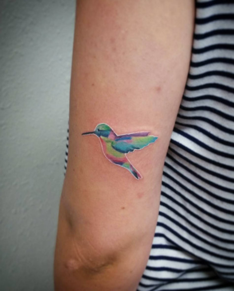 Hummingbird tattoo by Eric Gibbs