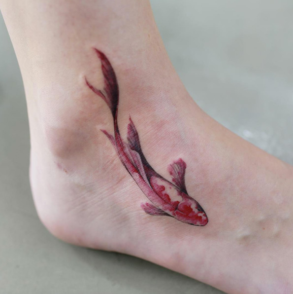 Koi fish on ankle by Doy