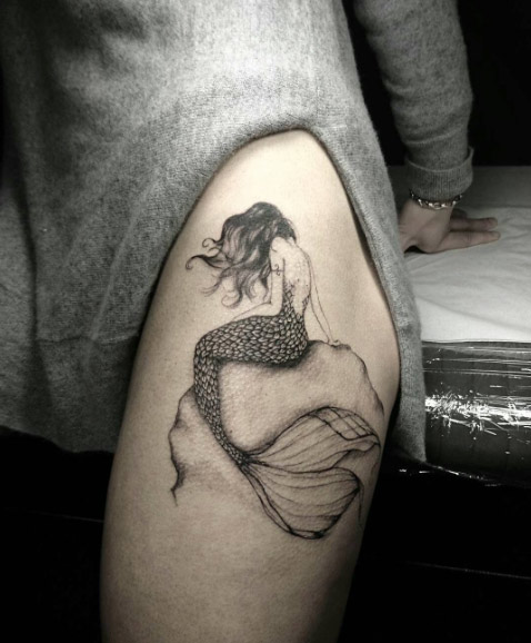 Mermaid tattoo on thigh by Thierry Lessa