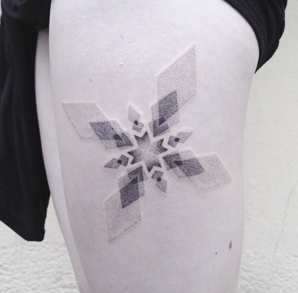 Mesmerizing snowflake tattoo by Jakub Nowicz