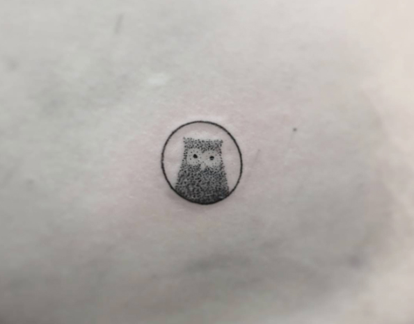 Micro owl tattoo by Lindsay April