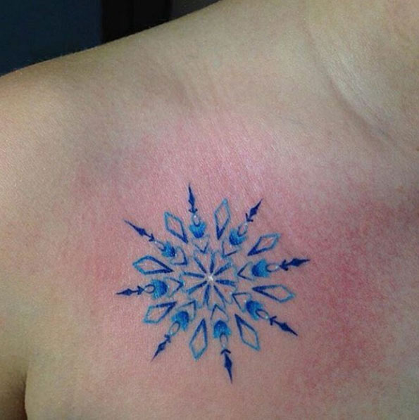 Shades of blue snowflake tattoo by Robbie Flaviani