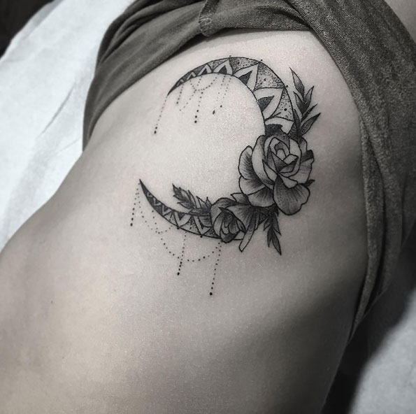 Ornamental moon tattoo with rose accent by Justin Hobson